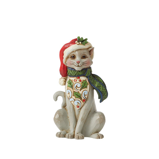 Heartwood Creek Festive Cat Mini Figurine  Designed by award winning artist Jim Shore as part of the Heartwood Creek Mini Figurine Collection, hand crafted using high quality cast stone and hand painted, this little festive Cat is perfect for the Christmas season.