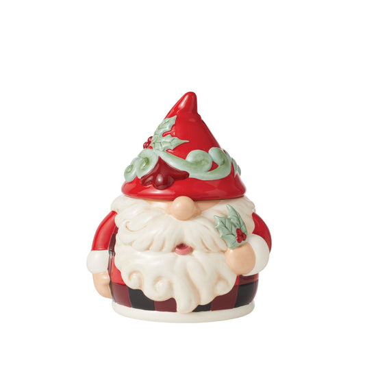 No one knows gnomes like Jim Shore! Creating yet another gorgeous guardian, Jim Shore has put a playful spin on Christmas. This Holiday Glen holiday gnome doubles as a cookie stash jar and features a gnome who may or may not want to steal your cookies.