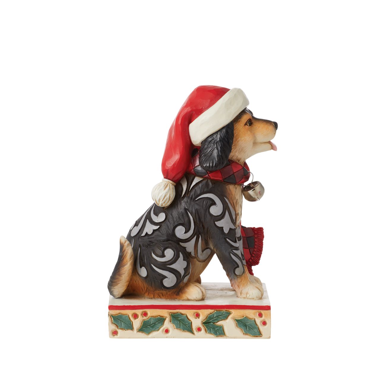 Heartwood Creek Highland Glen Dog in Santa Hat Figurine  Designed by award winning artist Jim Shore as part of the Heartwood Creek Highland Glen Collection, hand crafted using high quality cast stone and hand painted, this cute & cosy dog is perfect for the Christmas season.