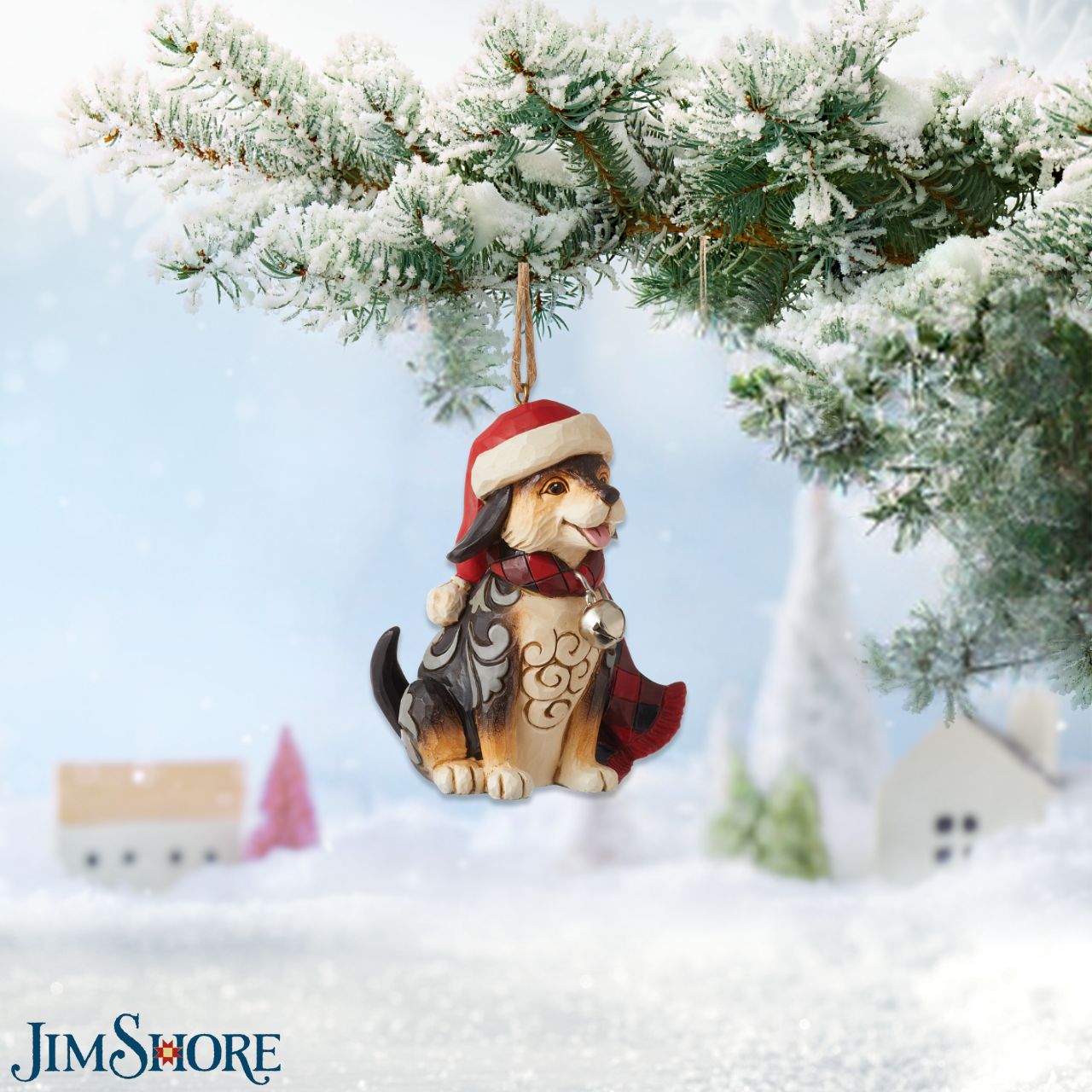 Heartwood Creek Highland Glen Dog in Scarf Hanging Ornament  Designed by award winning artist Jim Shore as part of the Heartwood Creek Highland Glen Collection, hand crafted using high quality cast stone and hand painted, this cute dog hanging ornament is perfect for the Christmas season.