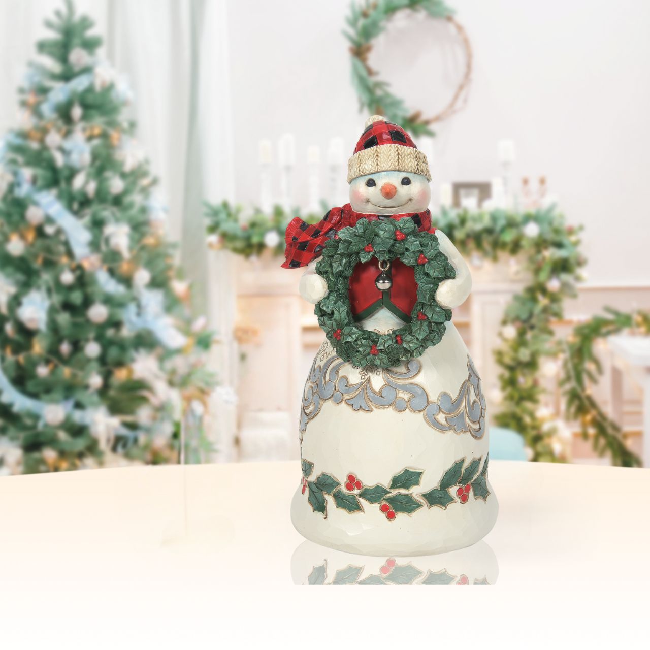 Heartwood Creek Highland Glen Mr Snowman Figurine  Designed by award winning artist Jim Shore as part of the Heartwood Creek Highland Glen Collection, hand crafted using high quality cast stone and hand painted, this festive Snowman is perfect for the Christmas season.