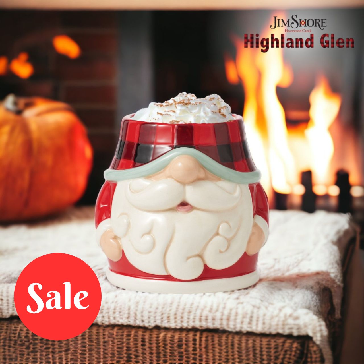 Heartwood Creek Highland Glen Mug  Designed by award winning artist Jim Shore as part of the Heartwood Creek Highland Glen Collection, hand crafted using high quality cast stone and hand painted, this festive mug is perfect for the Christmas season.