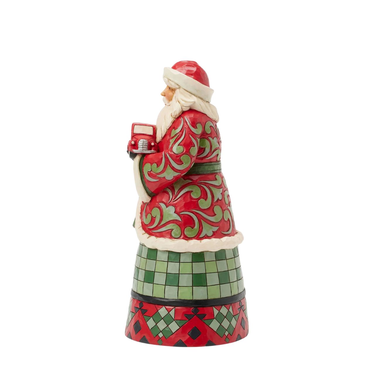 This charming Jim Shore design features Santa holding a Red Truck, dressed in a cosy buffalo plaid cloak that embodies holiday warmth. He captures the spirit of the season.
