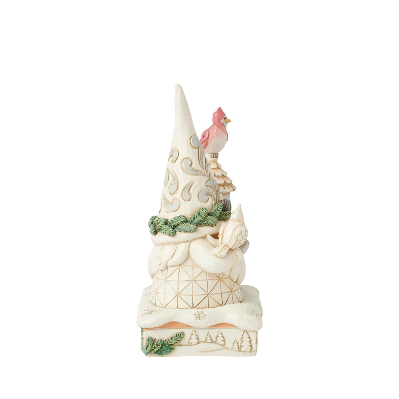 This charming Jim Shore White Woodland design features a delightful gnome dressed in white, standing beside a birch tree birdhouse. With two cardinals enjoying his sweet company, the piece beautifully captures the warmth and joy of winter wildlife.