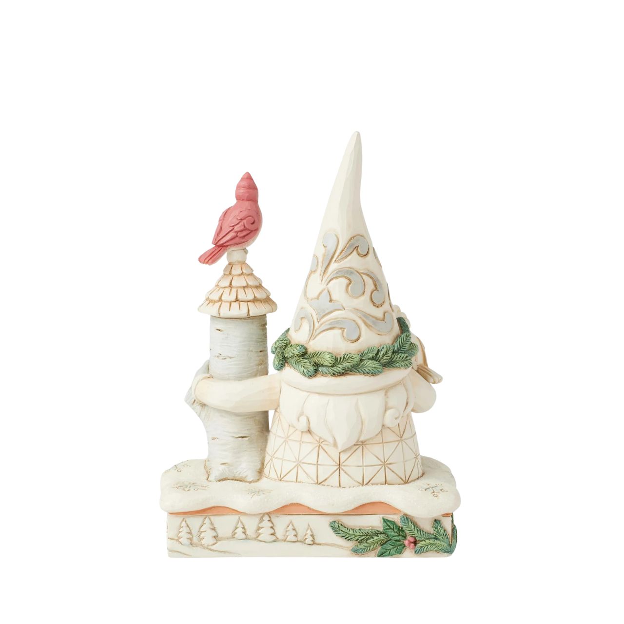 This charming Jim Shore White Woodland design features a delightful gnome dressed in white, standing beside a birch tree birdhouse. With two cardinals enjoying his sweet company, the piece beautifully captures the warmth and joy of winter wildlife.