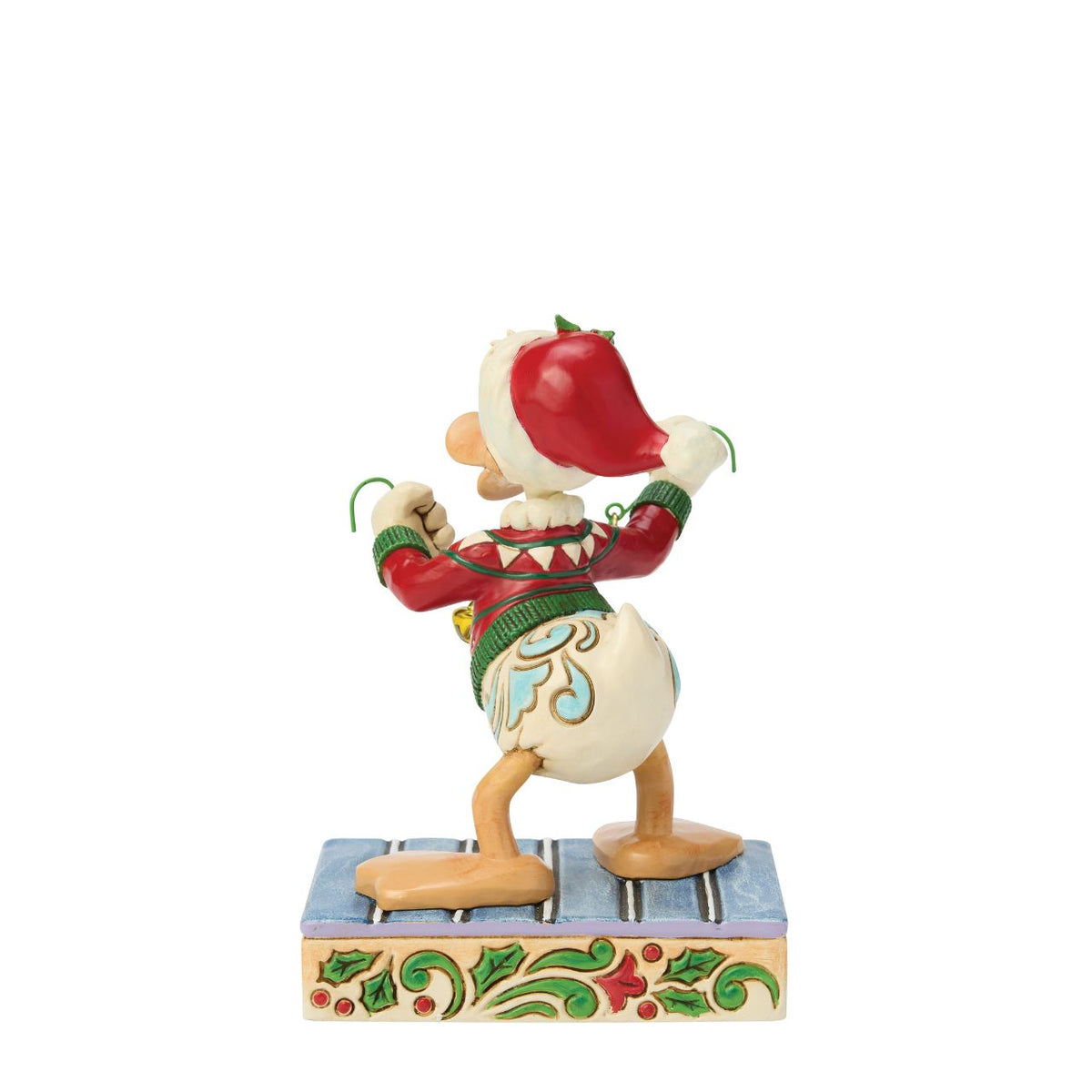 Donald Duck spreads holiday cheer with a jingling set of real bells in this festive Jim Shore design. Dressed in a Santa hat and a festive sweater, Donald is bursting with personality, and ready to ring in the season with joy and laughter.