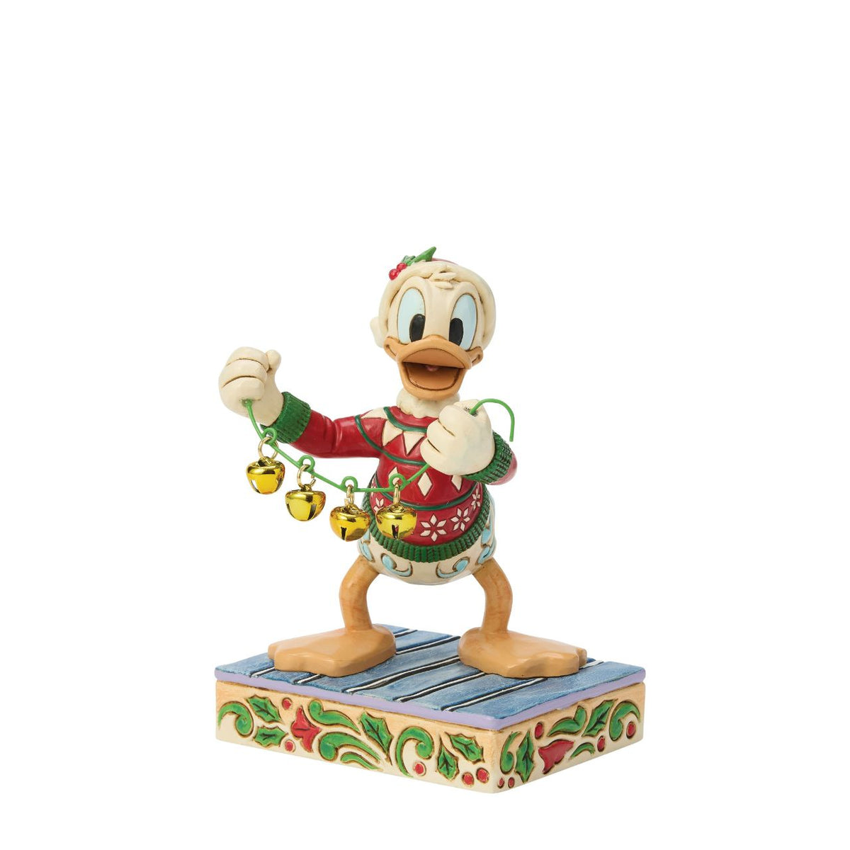 Donald Duck spreads holiday cheer with a jingling set of real bells in this festive Jim Shore design. Dressed in a Santa hat and a festive sweater, Donald is bursting with personality, and ready to ring in the season with joy and laughter.