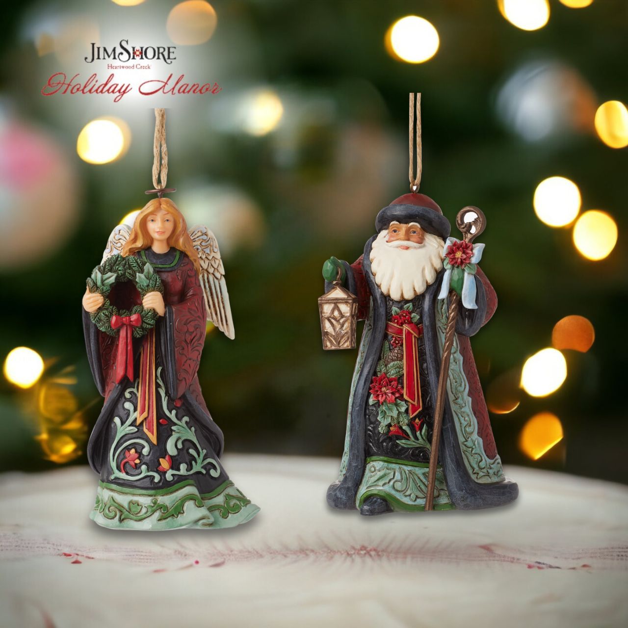 Heartwood Creek Holiday Manor Santa with Lantern Hanging Ornament  Designed by award winning artist Jim Shore as part of the Heartwood Creek Holiday Manor Collection, hand crafted using high quality cast stone and hand painted, this Santa with lantern hanging ornament is perfect for the Christmas season.