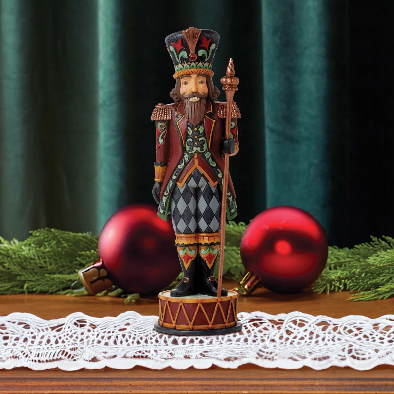 Hand crafted and hand painted, straight from the imagination of award-winning artist Jim Shore. Taking inspiration from traditional folk art, quilting designs, and iconic features like rosemaling, the mixture of colour, tones and glitter make each piece the perfect accessory for the best time of year - Christmas.