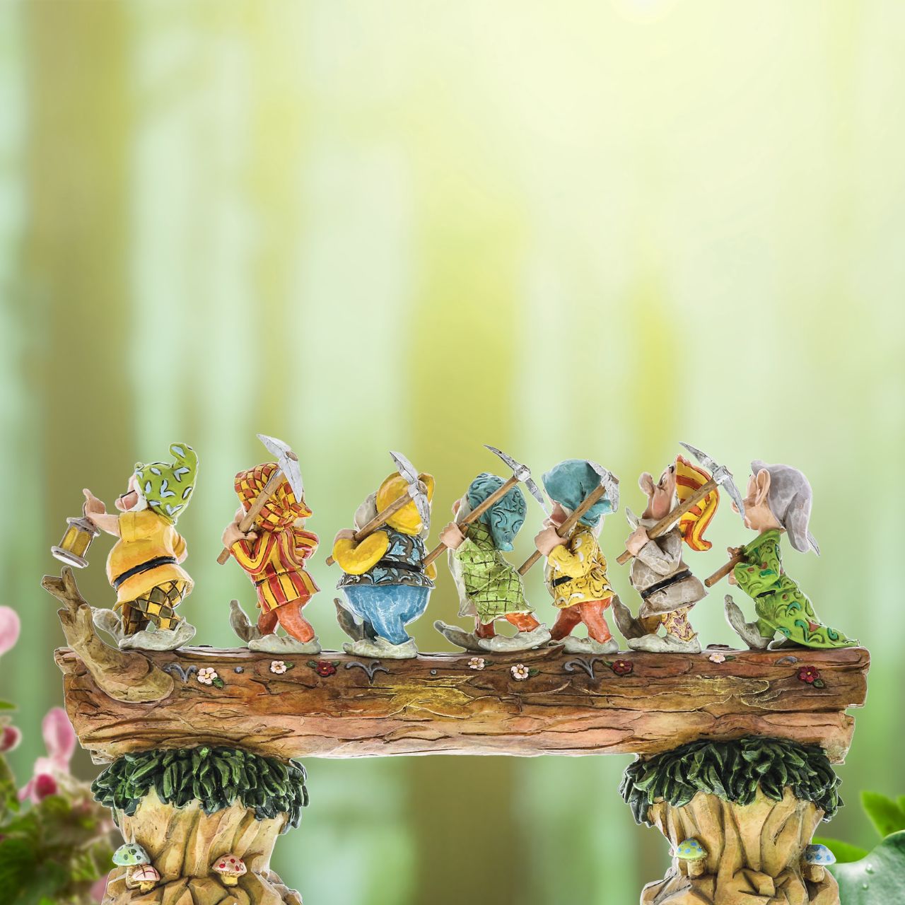 Homeward Bound captures a very memorable scene from the classic Snow White animation; the lovable 7 Dwarfs return home to find an unexpected house guest: a sleeping Princess. Designed by award winning artist and sculptor, Jim Shore for the Disney Traditions brand.