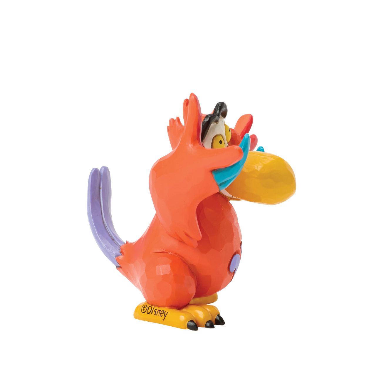 Jafar's big mouthed, feathered sidekick, Iago, comes to life in this personality filled Jim Shore figurine. With vibrant folk art details and a mischievous grin, Iago brings a touch of villainous fun to any Disney lover's home.