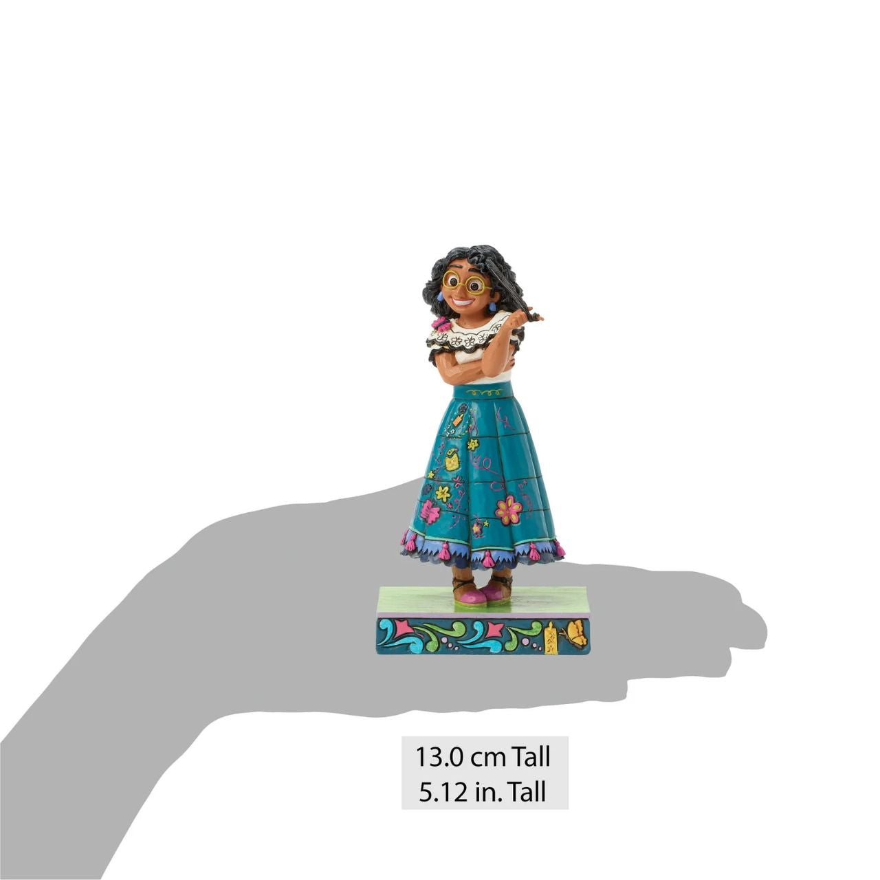 Mirabel's lovable spirit shines as she twirls one of her curls in this striking Jim Shore bust. She's finding herself and her magic alongside Jim Shore's enchanting colours and intricate patterns that capture her charm and growing confidence.