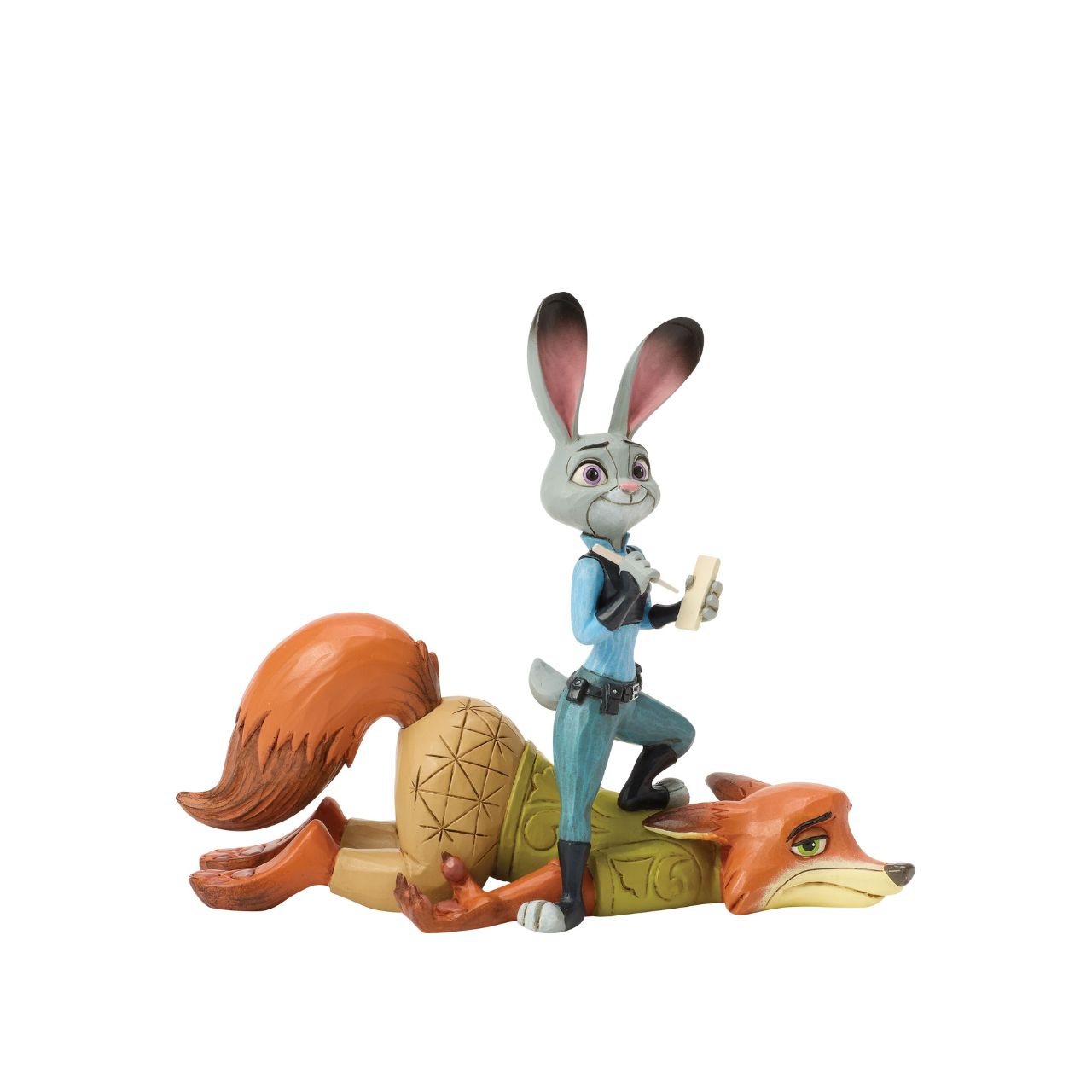 From Zootopia, Judy Hopps and Nick Wilde share a moment of playful teamwork in this Jim Shore reimagining. With bright folk art patterns and colourful detail, it celebrates friendship and playfulness. Judy stands ready to take notes, on top of Nick.