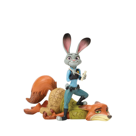 From Zootopia, Judy Hopps and Nick Wilde share a moment of playful teamwork in this Jim Shore reimagining. With bright folk art patterns and colourful detail, it celebrates friendship and playfulness. Judy stands ready to take notes, on top of Nick.