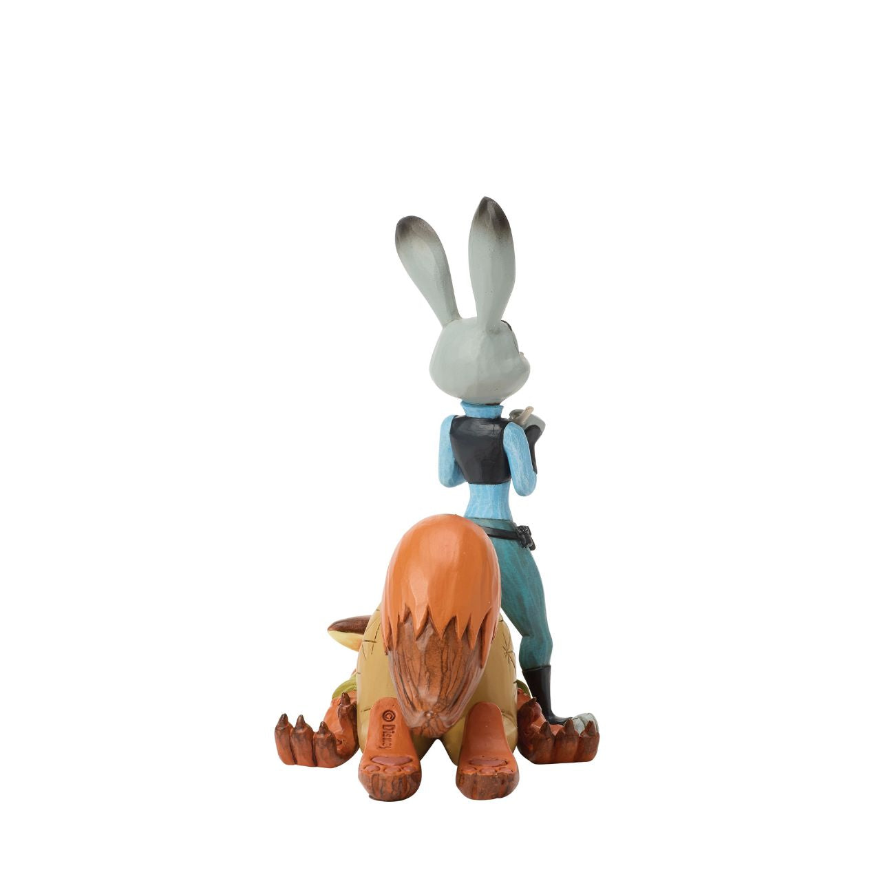 From Zootopia, Judy Hopps and Nick Wilde share a moment of playful teamwork in this Jim Shore reimagining. With bright folk art patterns and colourful detail, it celebrates friendship and playfulness. Judy stands ready to take notes, on top of Nick.
