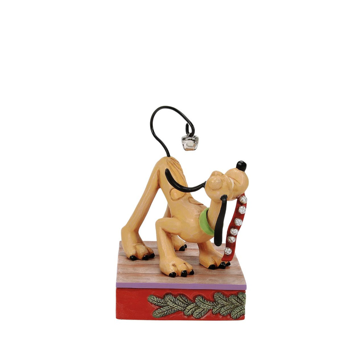 Celebrate Pluto's 95th anniversary with this enchanting Jim Shore scene, where Pluto conducts his own symphony of jingle bells, shaking a bell adorned collar and using his tail as an instrument.