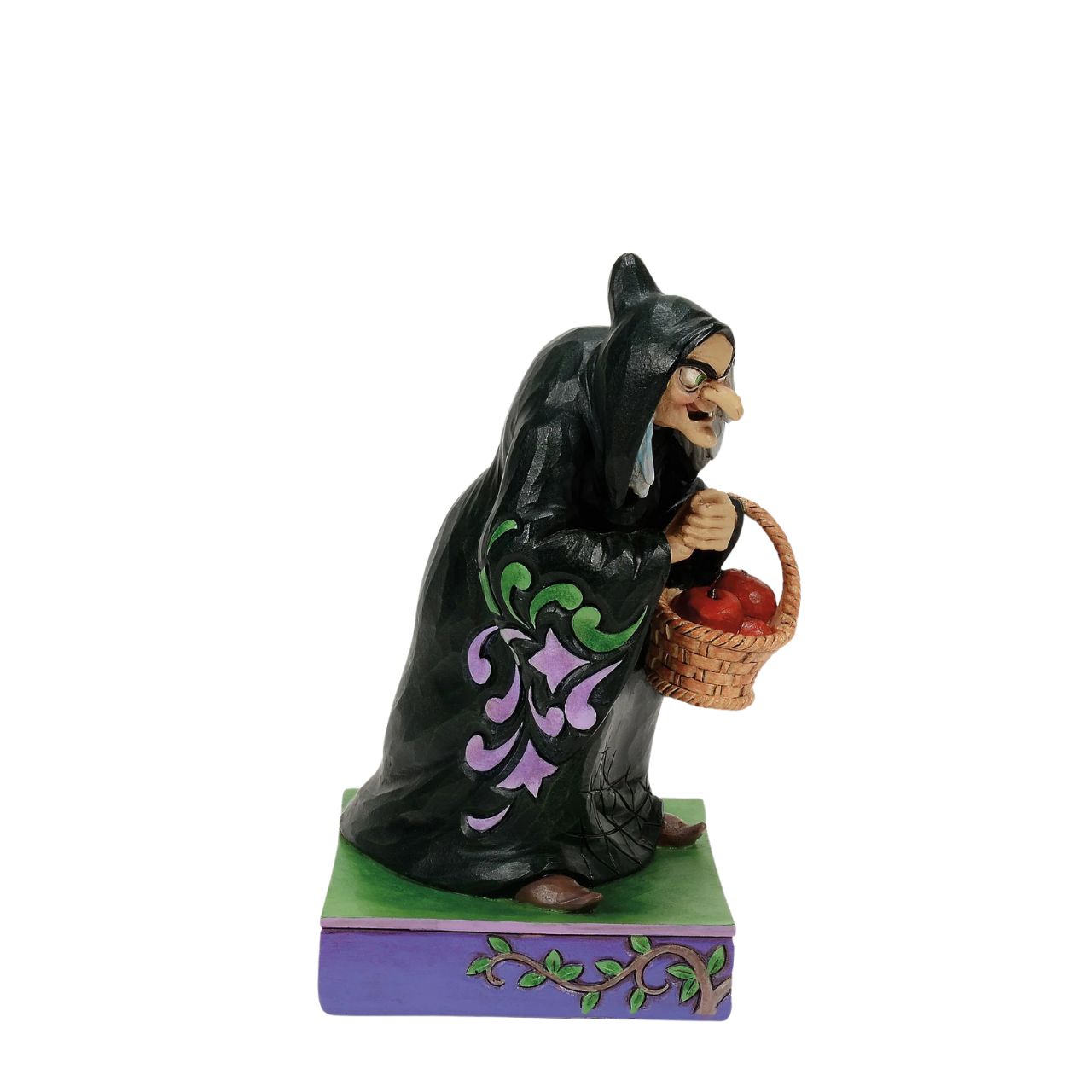 The original Disney villain, the Evil Queen in her disguise as The Hag in Snow White. Poised and ready to feed the fair Snow White the deadly apple, this is the perfect addition to any Disney collection.