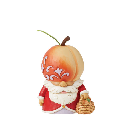 No one knows gnomes like Jim Shore. A master craftsman of the playful guardians, the beloved artist creates a new addition to his growing gnome collection. A peach inspired the gnomes fruit hat. A little basket in hand for picking a peck of peaches.