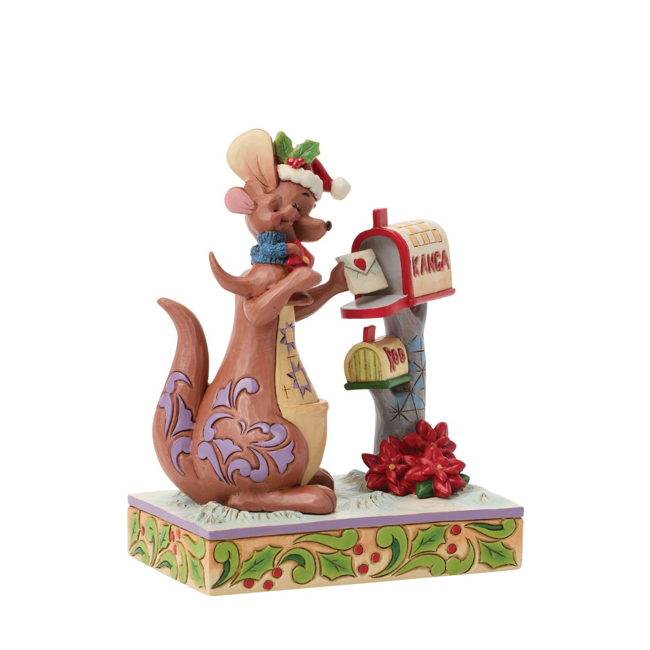 Jim Shore captures the love of family with beloved characters, Kanga and Roo sharing a holiday cuddle as they mail letters. With festive scarves and smiles, this delightful design brings the heart of the Hundred Acre Wood to your home for Christmas.