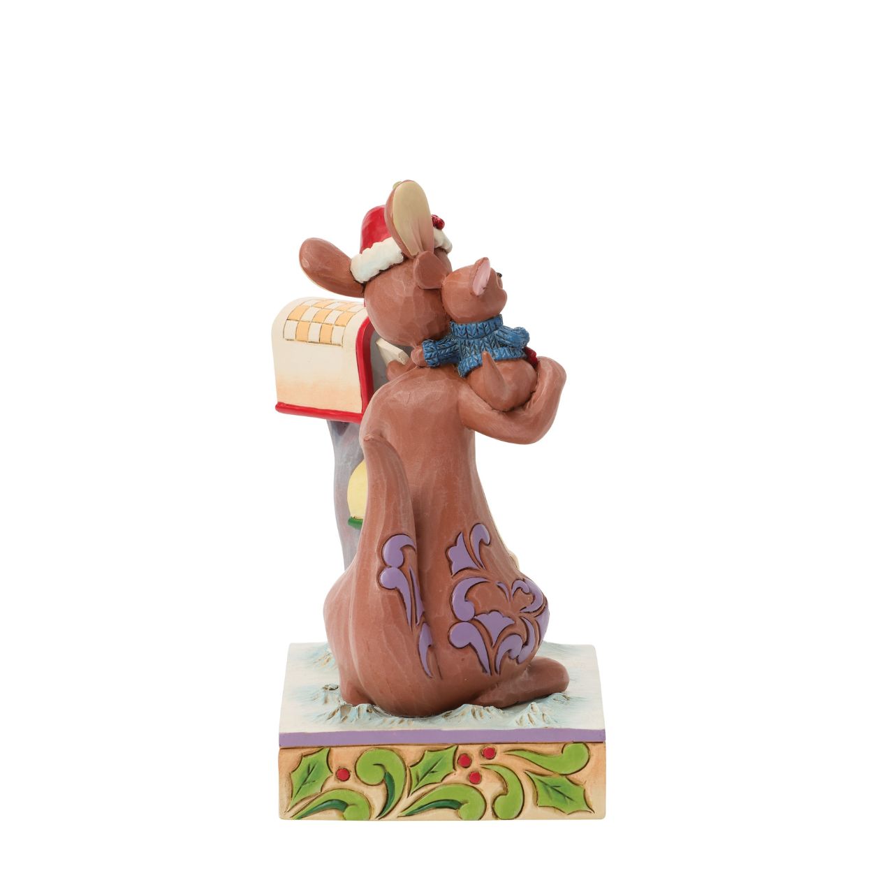Jim Shore captures the love of family with beloved characters, Kanga and Roo sharing a holiday cuddle as they mail letters. With festive scarves and smiles, this delightful design brings the heart of the Hundred Acre Wood to your home for Christmas.