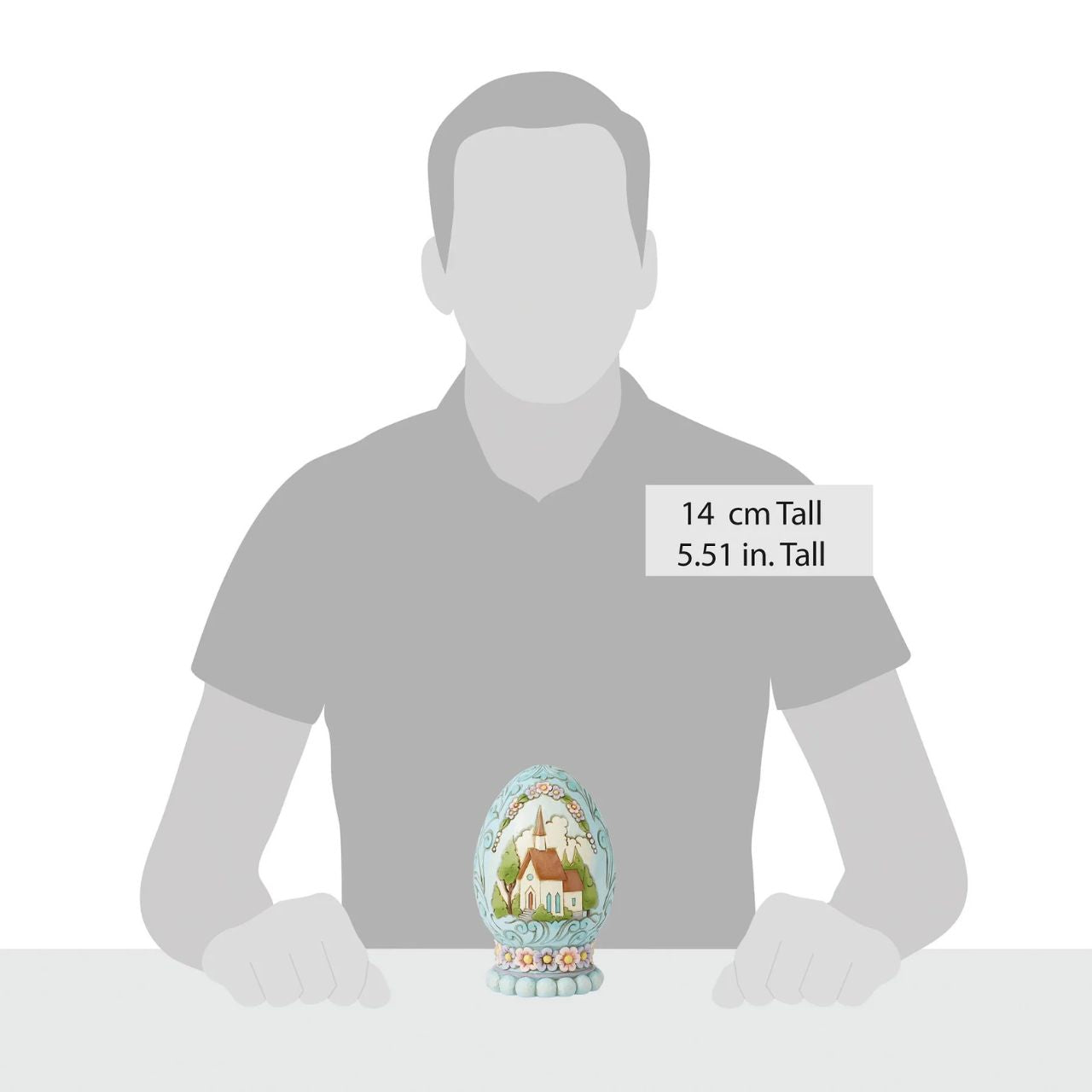 This beautiful 3D diorama egg depicts a quaint and tranquil church scene, hand painted in soft spring colours. Perfect for those who want a different kind of Easter display. Comes in fully branded packaging.