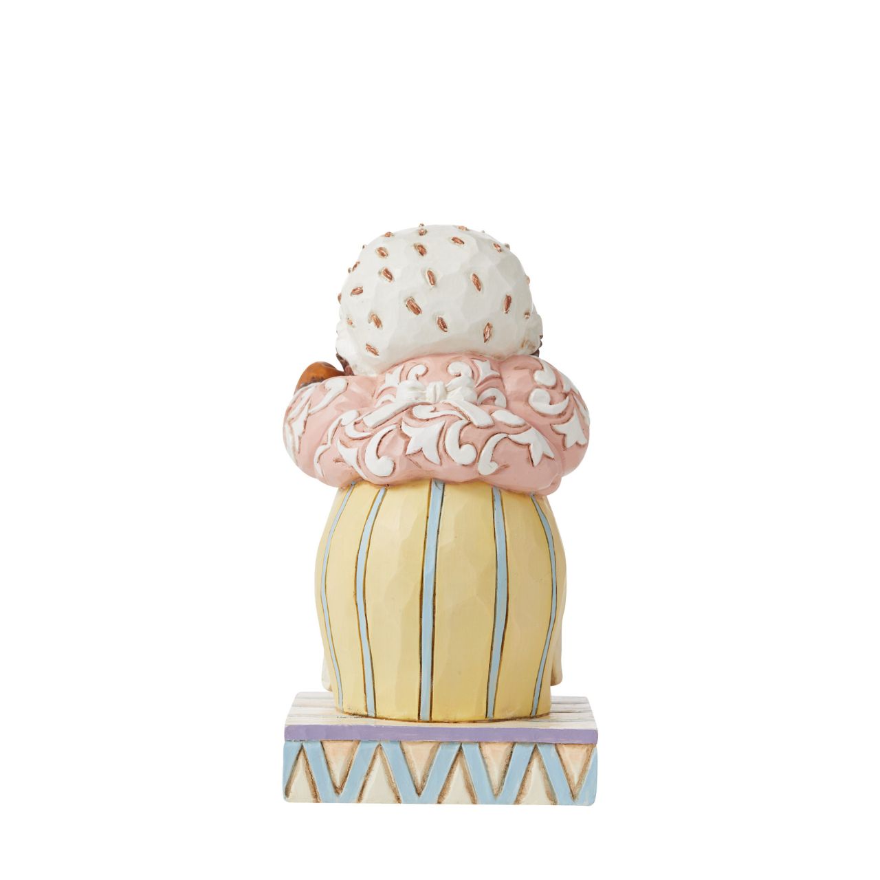 This Jim Shore figurine features the sociable hedgehog, Mrs. Tiggy-Winkle smiling sweetly, with iron in hand.