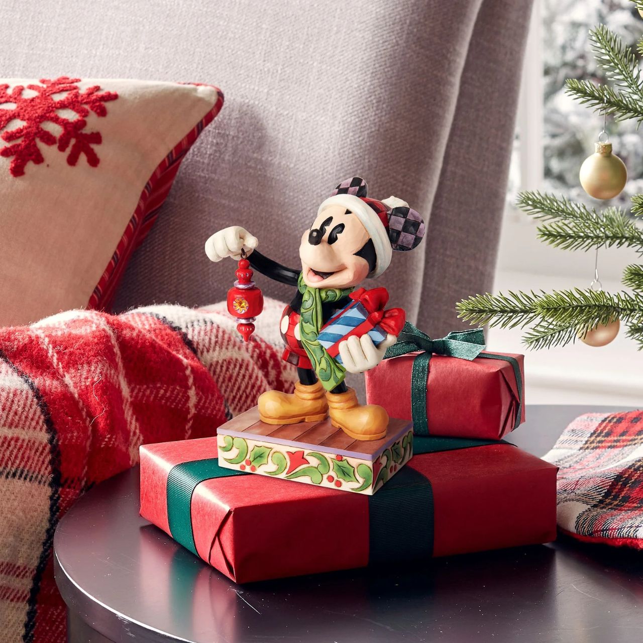 Produced in limited quantities especially for the 2024 World Wide Christmas Event, this piece is perfect for kicking off Christmas early. Featuring the iconic Mickey Mouse with a hanging ornament dangling from his hand and a festive Santa hat upon his head, this is the perfect addition to any Disney Collection.