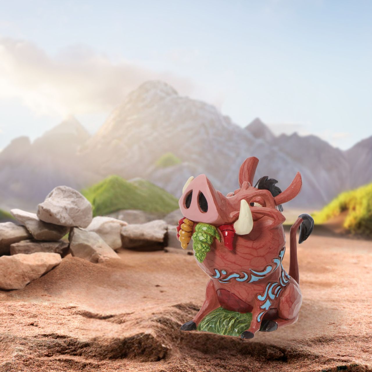 Pumba from the classic 1994 film The Lion King has been immortalised in this mini figurine. Designed by award winning artist Jim Shore, hand crafted using high quality cast stone and hand painted. Packaging: Full colour, fully branded gift box with photo.