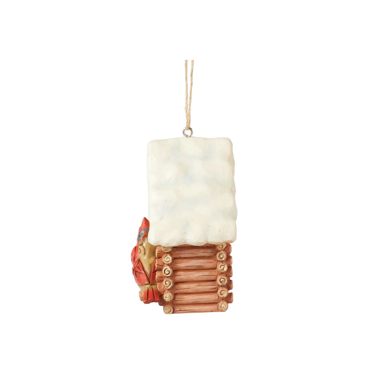 This Christmas at the Lodge enchanting Jim Shore ornament showcases a charming birdhouse designed to resemble a miniature log cabin, complete with Jim Shore's iconic rosemaling. Perched are a pair vibrant cardinals that add a touch of love.