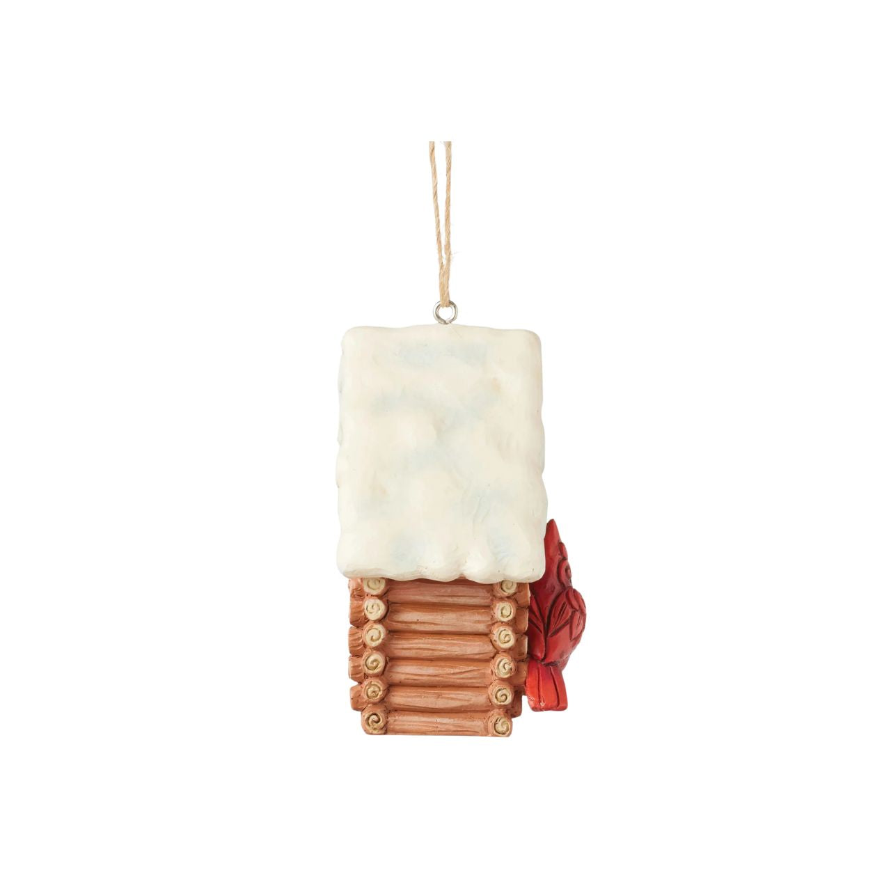 This Christmas at the Lodge enchanting Jim Shore ornament showcases a charming birdhouse designed to resemble a miniature log cabin, complete with Jim Shore's iconic rosemaling. Perched are a pair vibrant cardinals that add a touch of love.