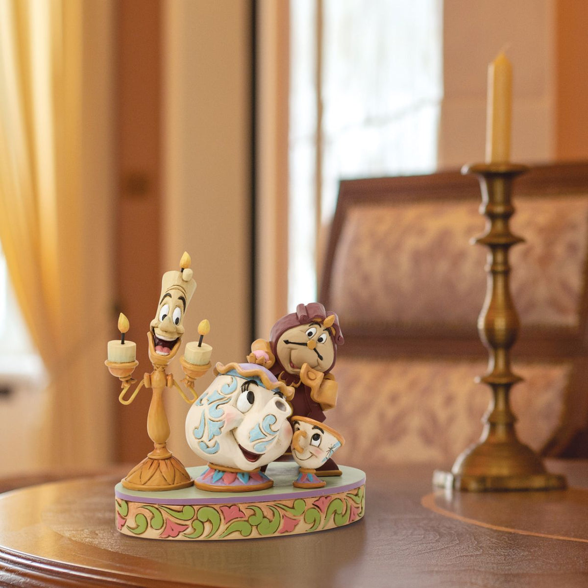 The enchanted castle's favourites shine in this delightful Jim Shore masterpiece. With Mrs. Potts, Chip, Lumiere, and Cogsworth posed with personality, each showcase the warmth, humour, and timeless charm of Disney's Beauty and the Beast.