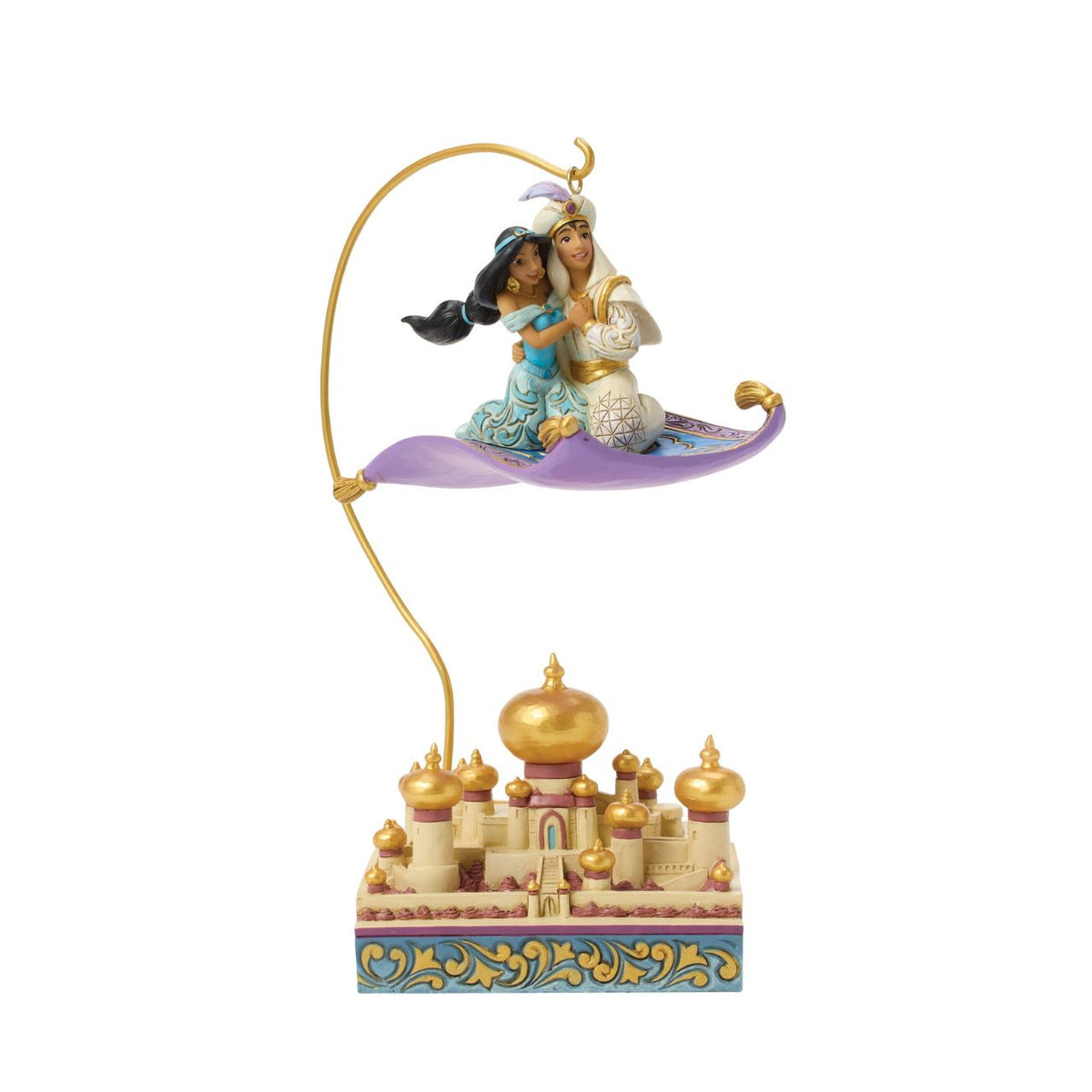 Aladdin and Jasmine soar above Agrabah on the magic carpet in this breath-taking Jim Shore scene. With an LED palace glowing below them, the pair captures the romance and wonder of Disney's unforgettable adventure.