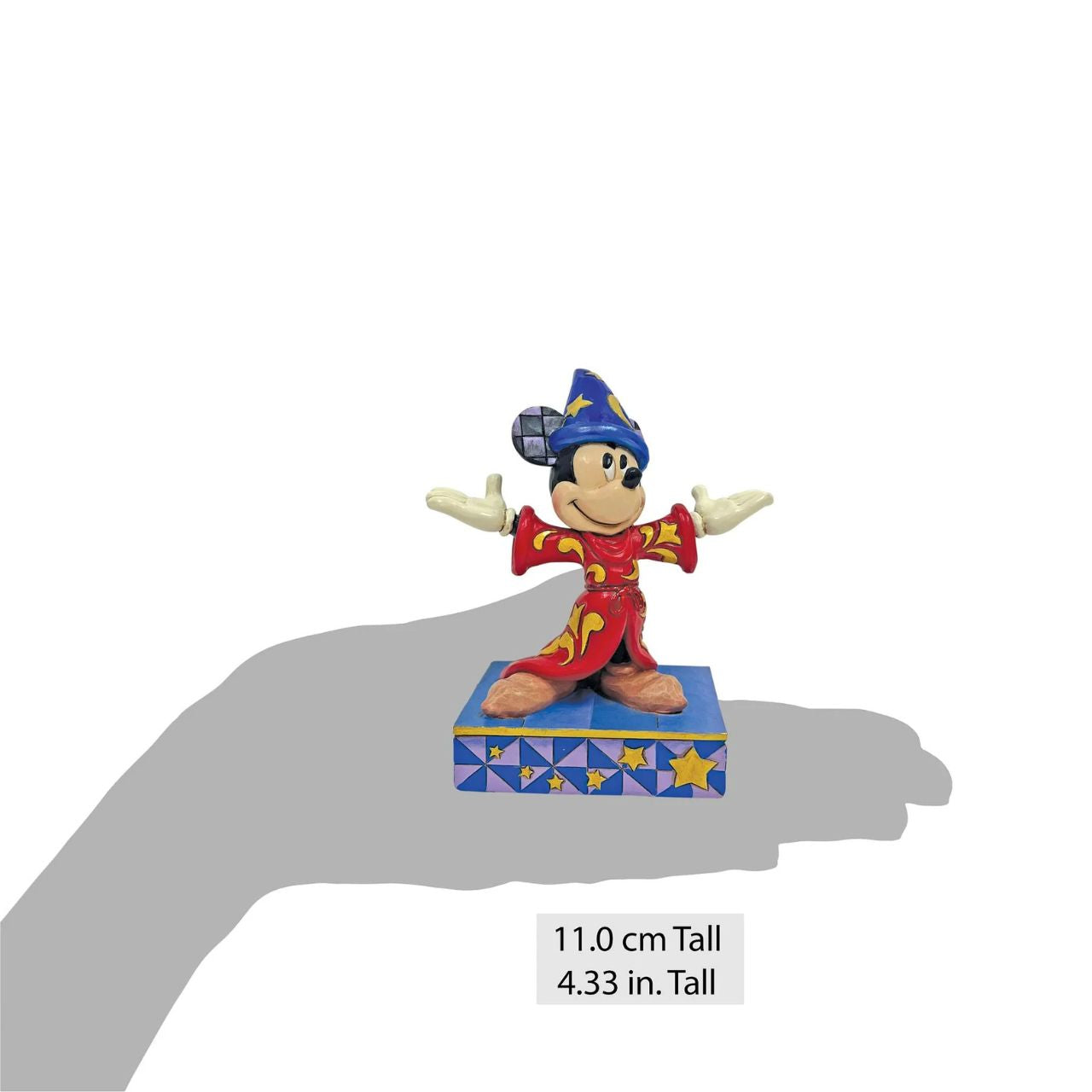 Celebrating the 85th anniversary of Fantasia in 2025, this Jim Shore Mickey Mouse is striking in red robes adorned with real gold cord and intricate rosemaling. With his sorcerer's hat, Mickey embodies the magic and wonder of the beloved classic.