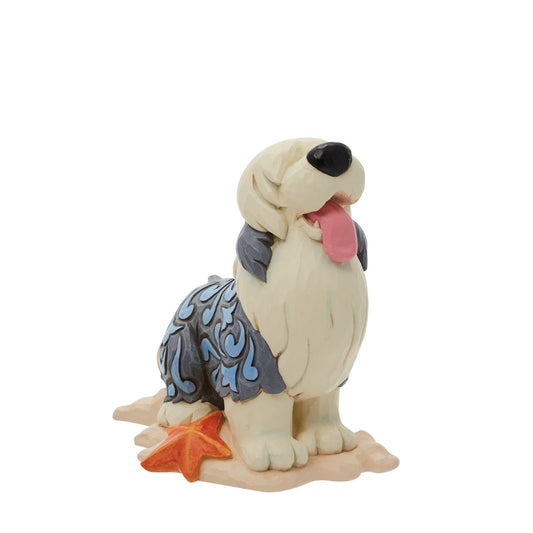 Max Mini Figurine by Jim Shore  Inspired by The Little Mermaid, this Jim Shore creation features Prince Eric's dog, Max, with the artist's iconic rosemale patterning and detailed craftsmanship. The replica makes a charming addition to any Disney lover's home décor.