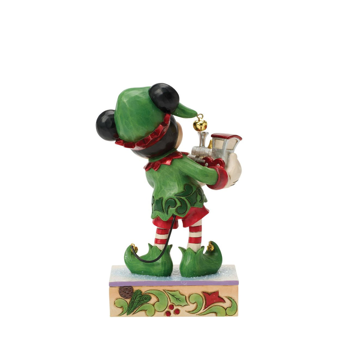 Mickey is Santa's helper as he hand delivers a festive toy train in this Special Edition Jim Shore holiday bust. Featuring bright folk art details and a sparkling gem on the engine, Mickey the elf brings holiday wonder to any Christmas display.