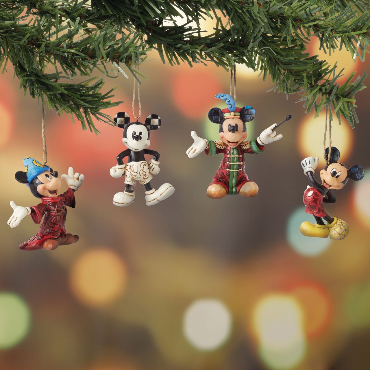 This set of four hanging ornaments feature the iconic Mickey mouse through the ages in some of his most recognisable roles.