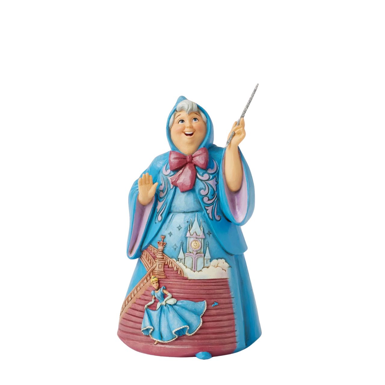 In this magical Jim Shore design, the Fairy Godmother smiles with her wand, her rosemaling blue robes parting to reveal Cinderella racing down the steps as the clock strikes midnight. This captivating moment is when she will lose her glass slipper.