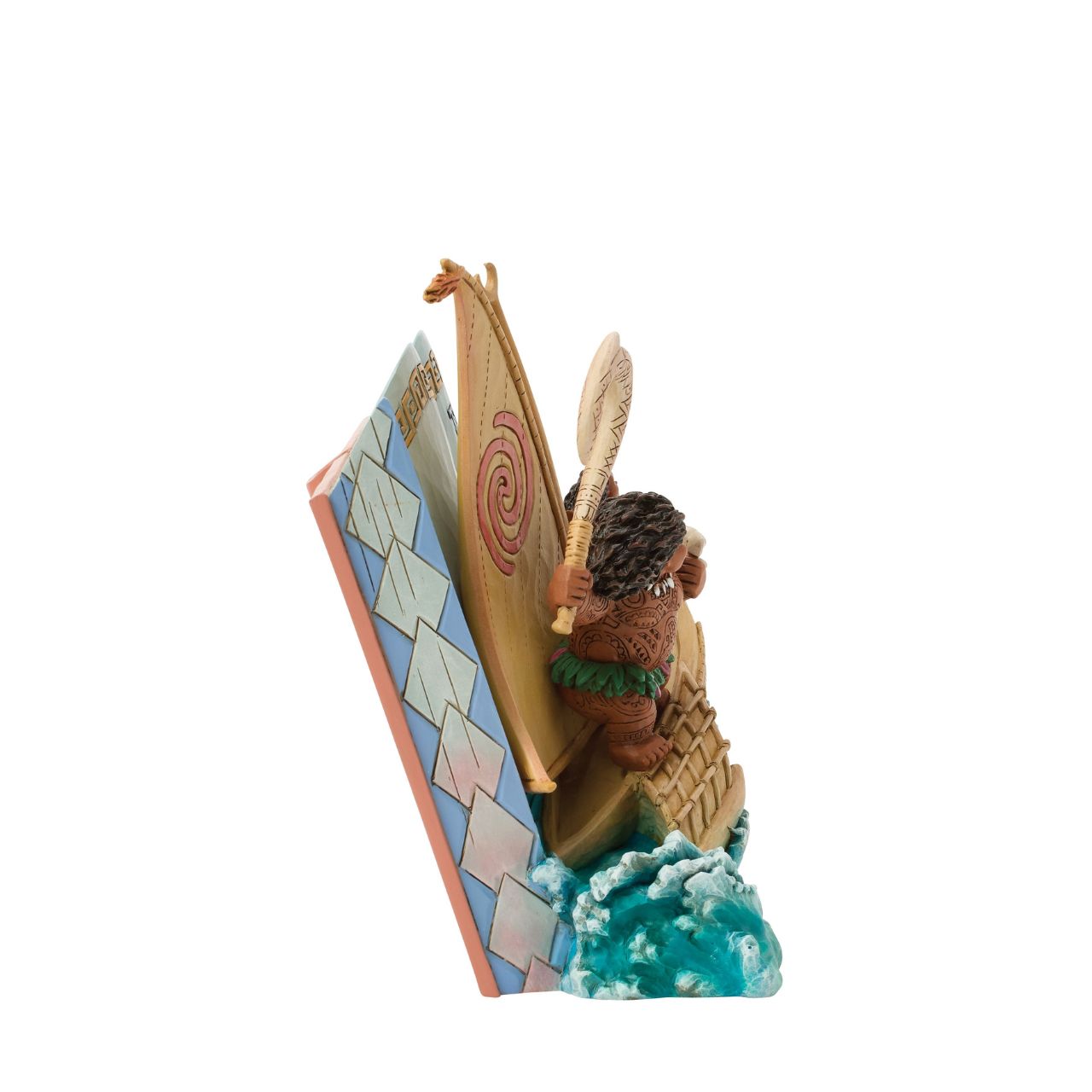Moana's journey unfolds from the pages of a storybook in this fantastic Jim Shore rendering. Soaring across the waters, Moana's story comes to life, capturing her courage, her connection to heritage, and the adventure that calls across the ocean.