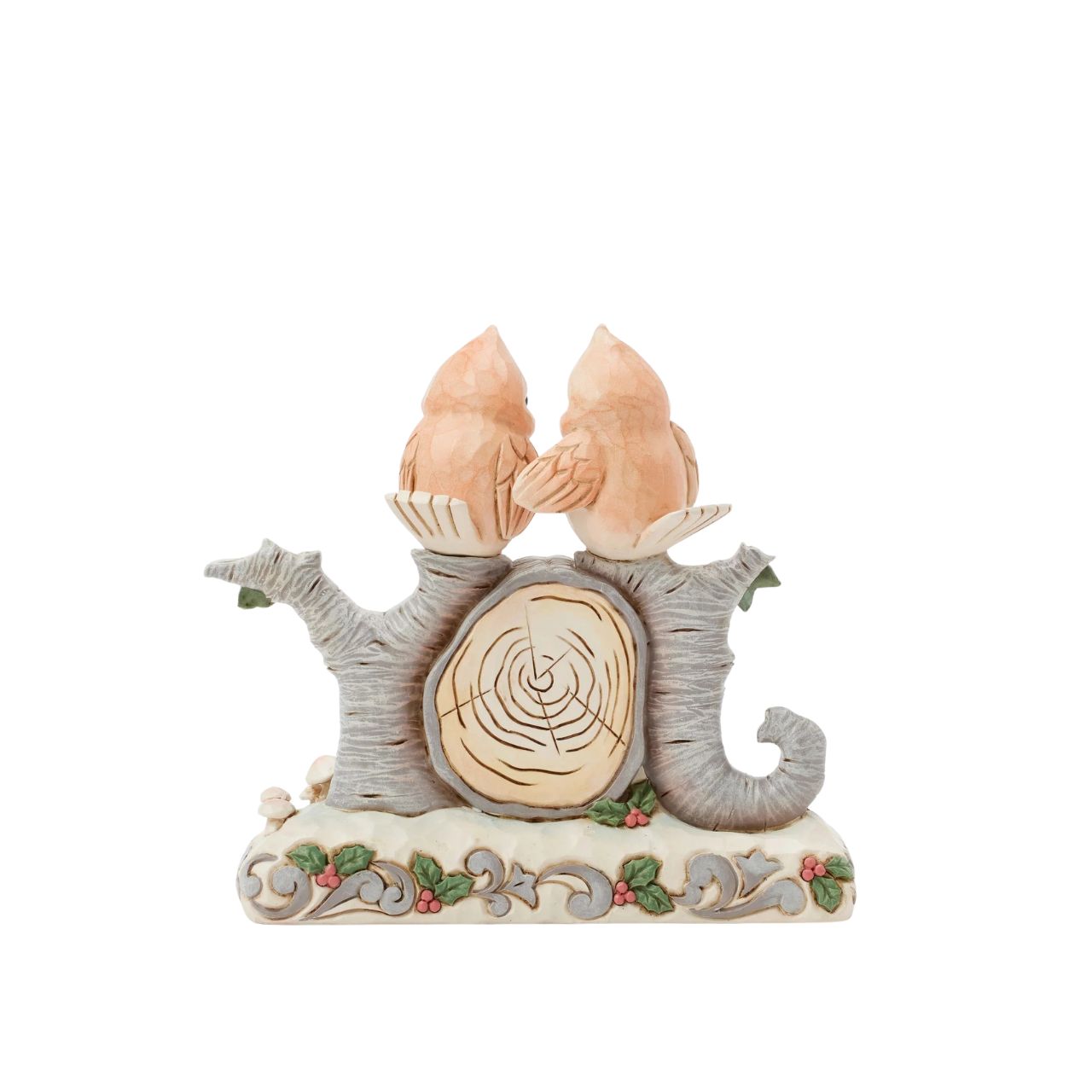 This charming Jim Shore design features two birds perched atop logs shaped into the word "Joy," embodying the spirit of love. Adorned with intricate rosemaling and surrounded by forest flowers, the piece captures the warmth of togetherness.