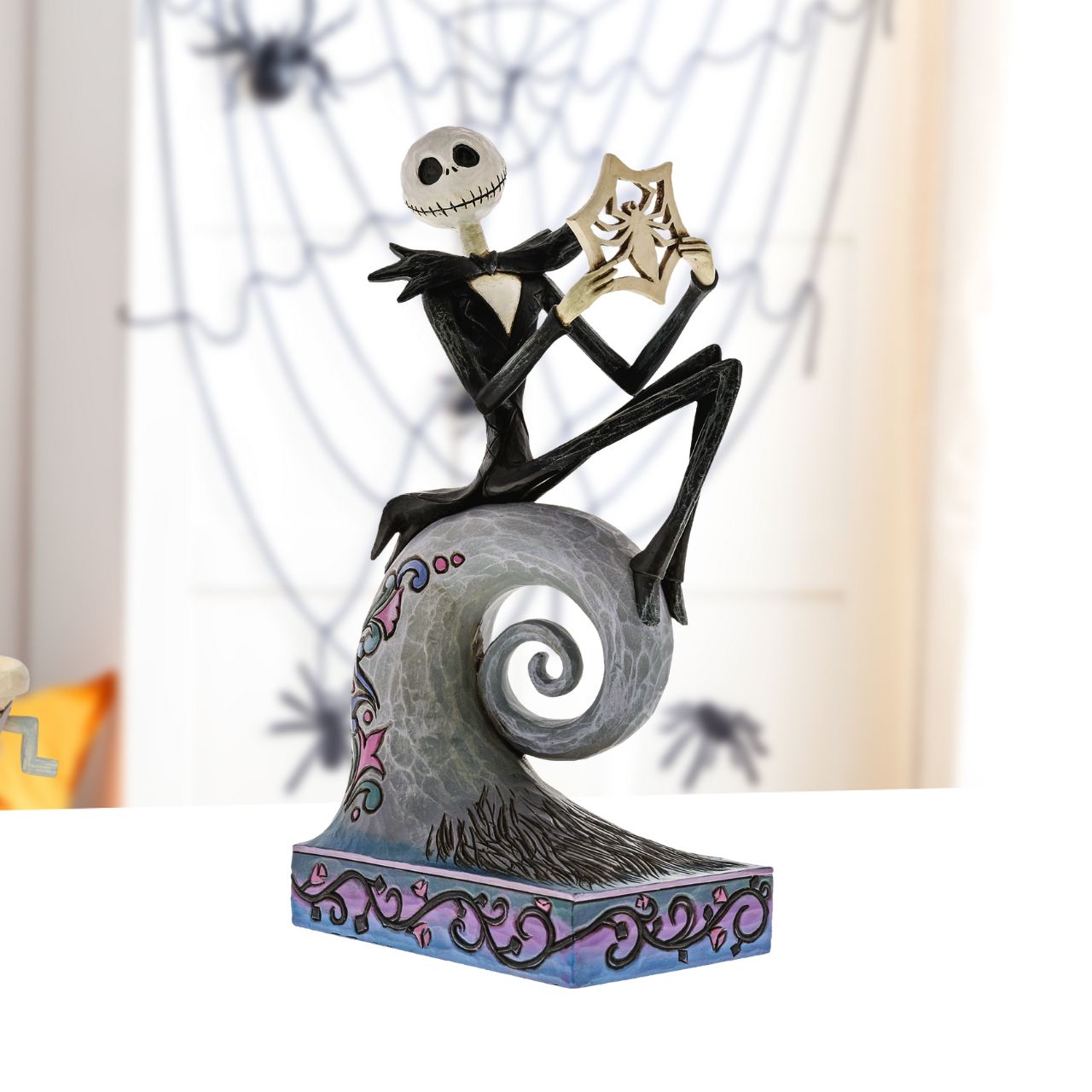 Disney Traditions by Jim Shore "What's This?" - Jack Skellington Figurine  In this captivating sculpture, Jim Shore features the King of Pumpkin Town discovering just how fun Christmas can be| In this Nightmare Before Christmas figurine you can almost hear Jack Skellington singing as he uncovers the delight of the holiday.