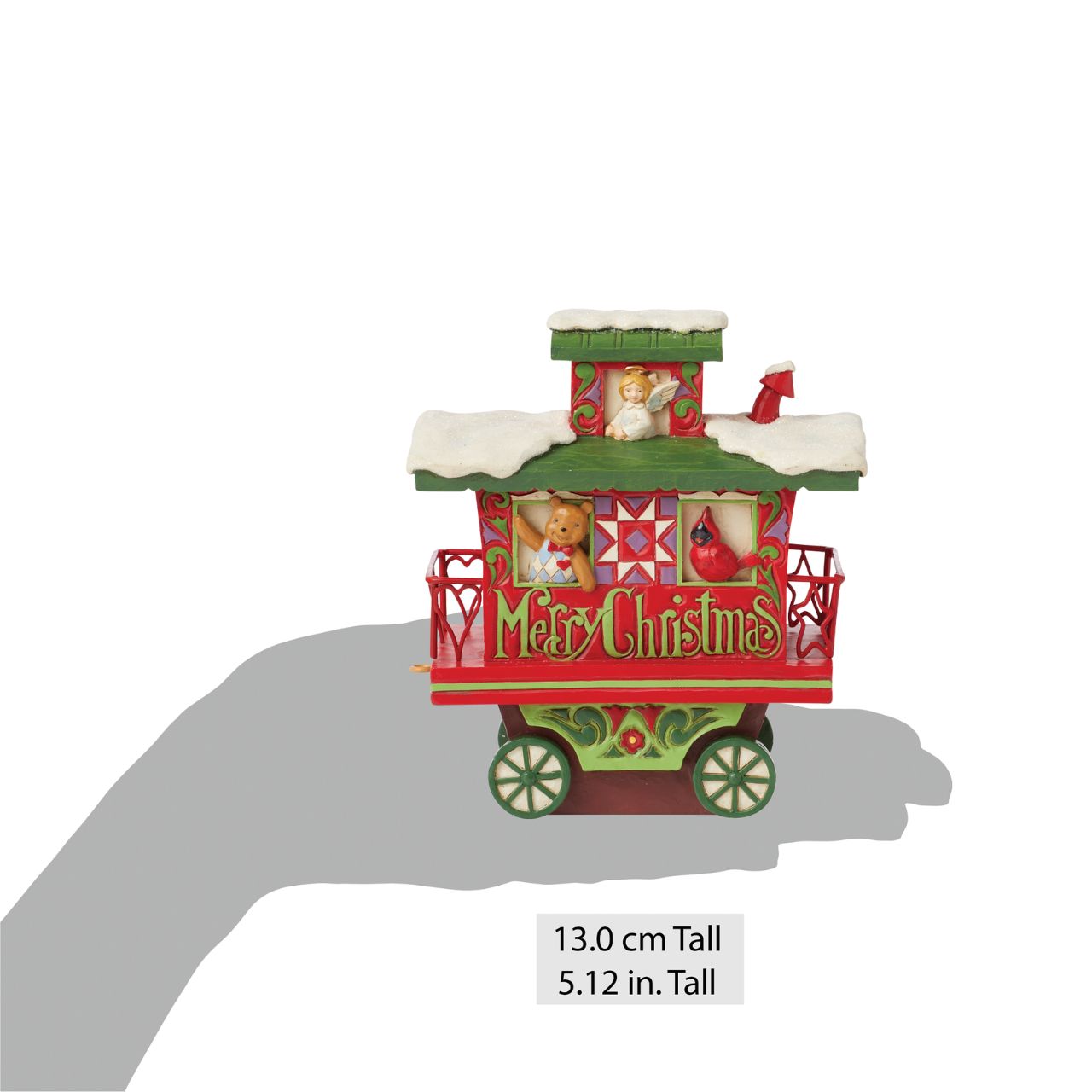 This train is bound for the holidays. This adorable caboose features a charming Merry Christmas message and several toy passengers enjoying the ride.