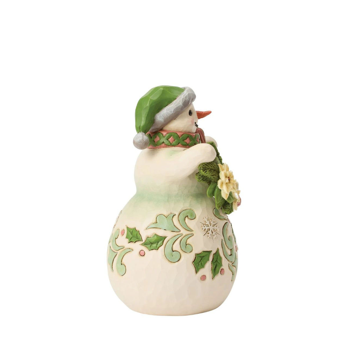 With a garland of pristine poinsettias draped in his snowy arms, this snowman radiates winter elegance. Jim Shore's hand-painted details and folk-art patterns turn this simple snowman into a heartfelt holiday scene, feeling like a frosty hug.