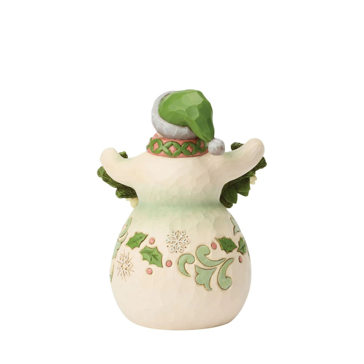 With a garland of pristine poinsettias draped in his snowy arms, this snowman radiates winter elegance. Jim Shore's hand-painted details and folk-art patterns turn this simple snowman into a heartfelt holiday scene, feeling like a frosty hug.