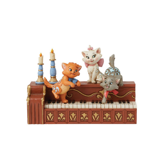 The mischievous but oh so cute kittens from Disneys Aristocats are ready play a tune. Berlioz, Marie and Toulouse are perched atop this piano, reminiscent of the iconic scene from the 1970 film, reimagined by Jim Shore as part of his Disney Traditions collections.