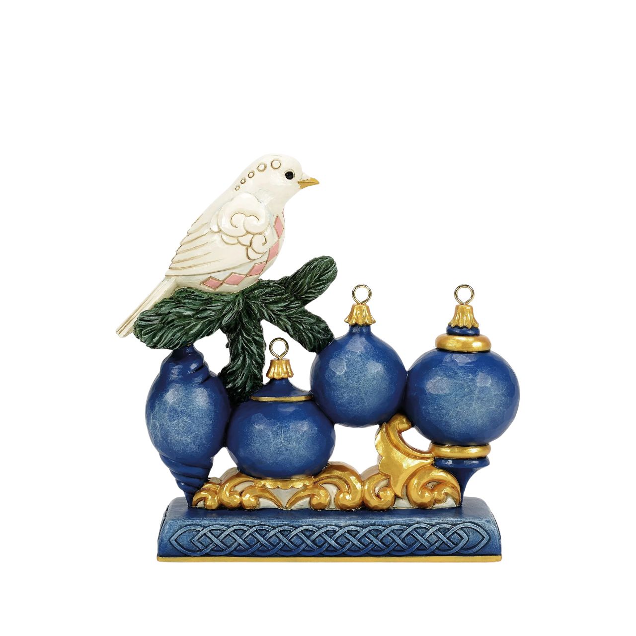 This elegant Jim Shore ornament features a beautifully patterned dove resting on a pine sprig, with a blue ornament adorned with a golden snowflake hanging gracefully below. The rich colours and details bring a sense of peace to your holiday home.