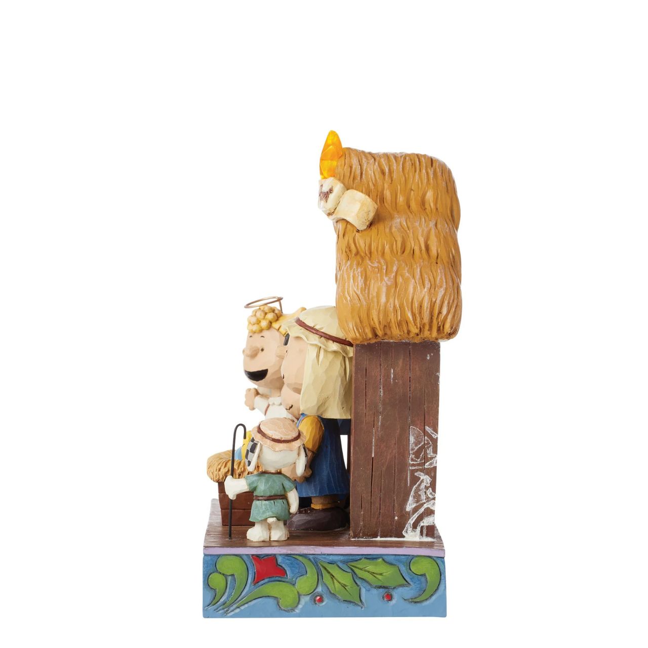Jim Shore invites you to the Peanuts Christmas pageant! On a rosemale stage, Lucy and Linus sit in a manger dressed as Mary and Joseph tending to a Woodstock baby Jesus. Sally is dressed as an angel and Snoopy is a shepherd.