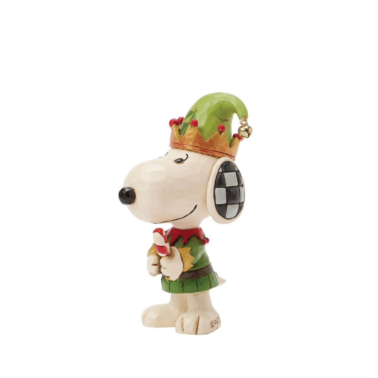 Snoopy figurine wearing a festive outfit with a crown on a white background