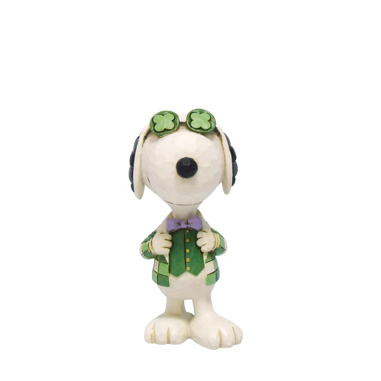 Snoopy celebrates St. Patrick's Day in style in this festive Jim Shore design. Dressed in a green blazer, vest, and bow tie, Snoopy sports shamrock shades and spreads Irish cheer. Jim Shore's signature folk-art details add a charming touch of luck.