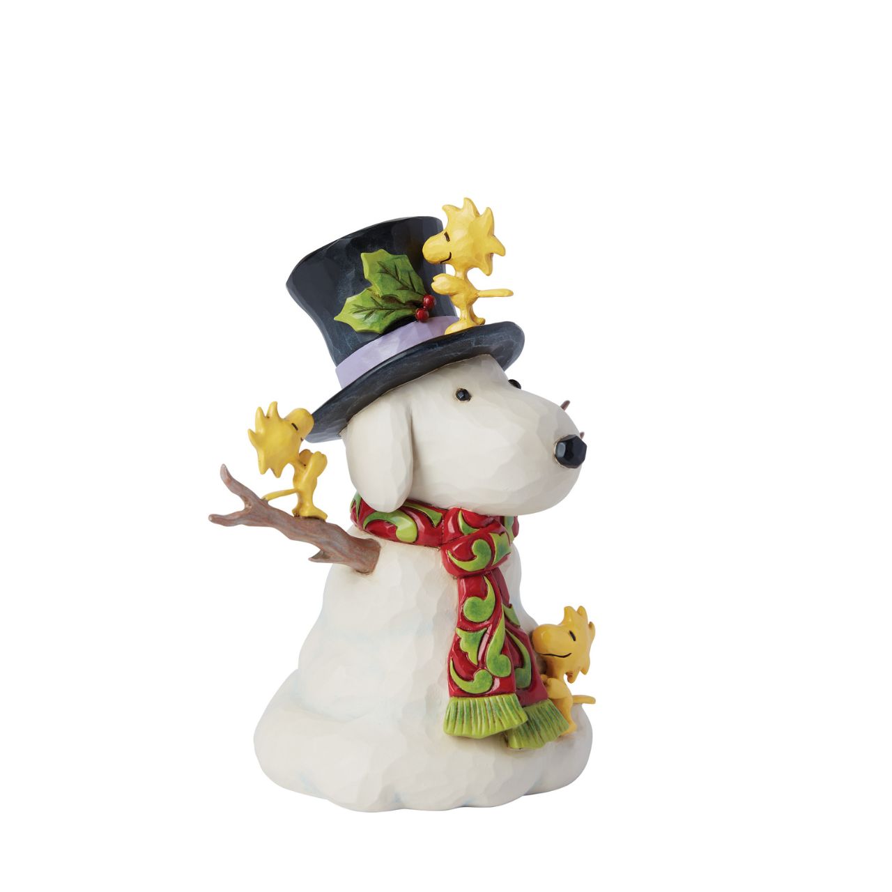 This cheerful creation from Jim Shore shares a scene of Woodstock and his brothers sculpting a snowman in the shape of Snoopy. Modelling their creation after their best friend, the birds lovingly adjust the snowman's hat and rosemale scarf.