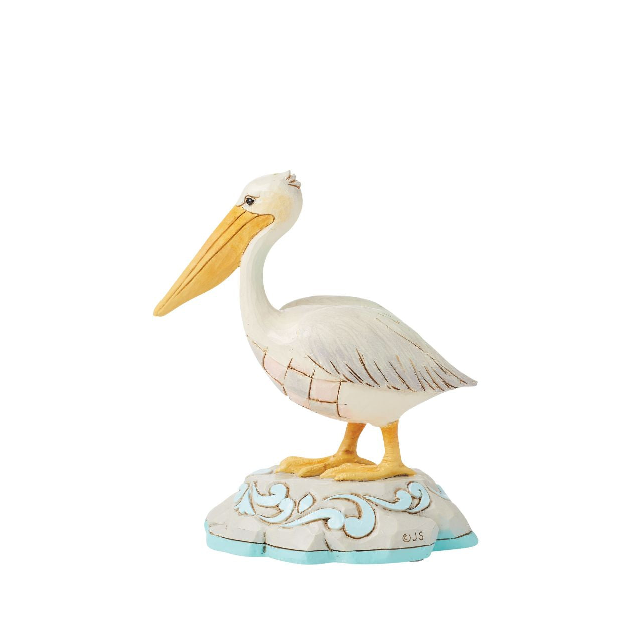 Embrace coastal charm with this magnificent Jim Shore pelican figurine, adorned with the artist's distinctive patchwork patterning, capturing the essence of seaside beauty. This stunning piece brings a touch of coastal elegance to any space.